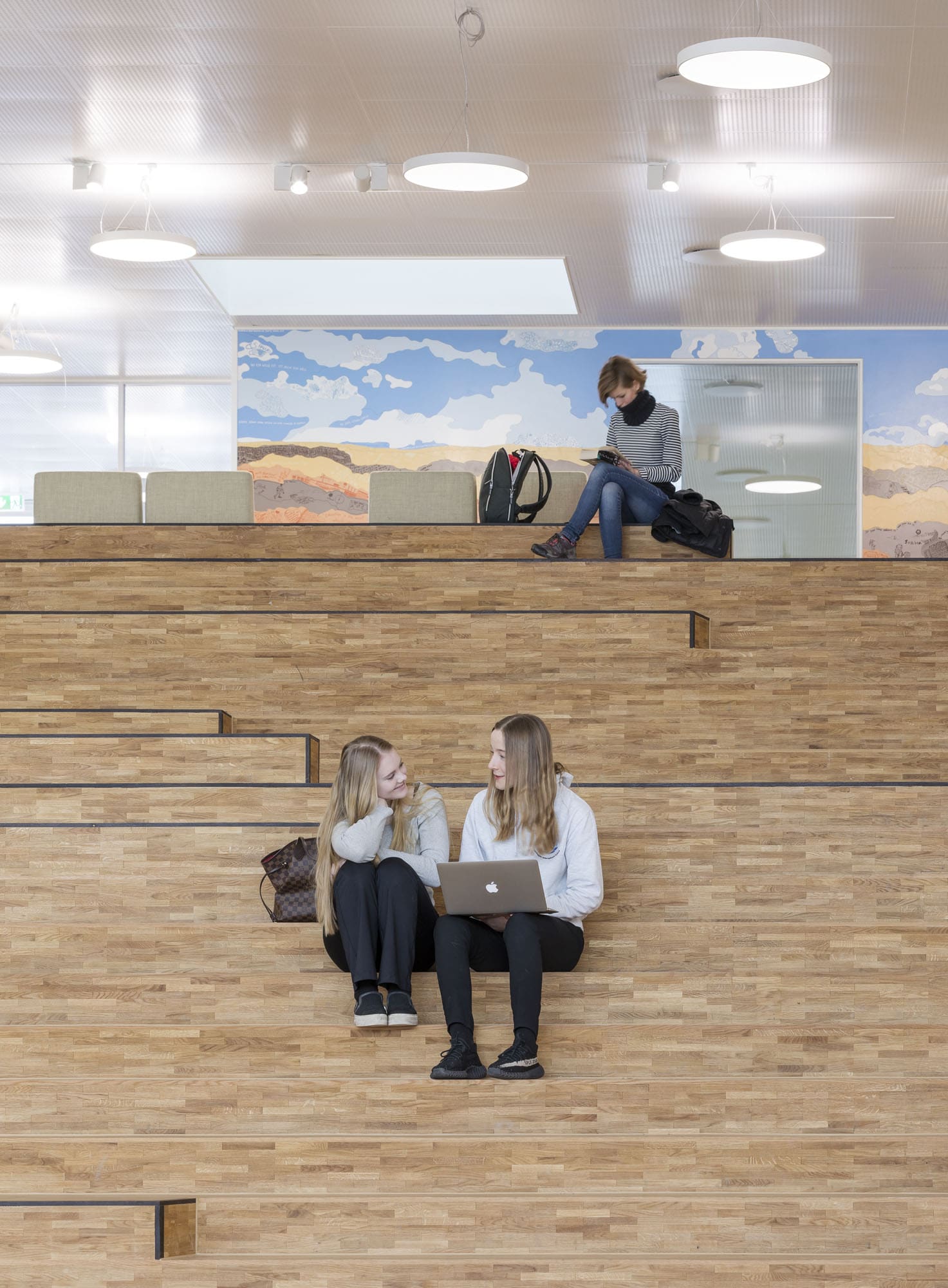 photo of an students sitting and talking