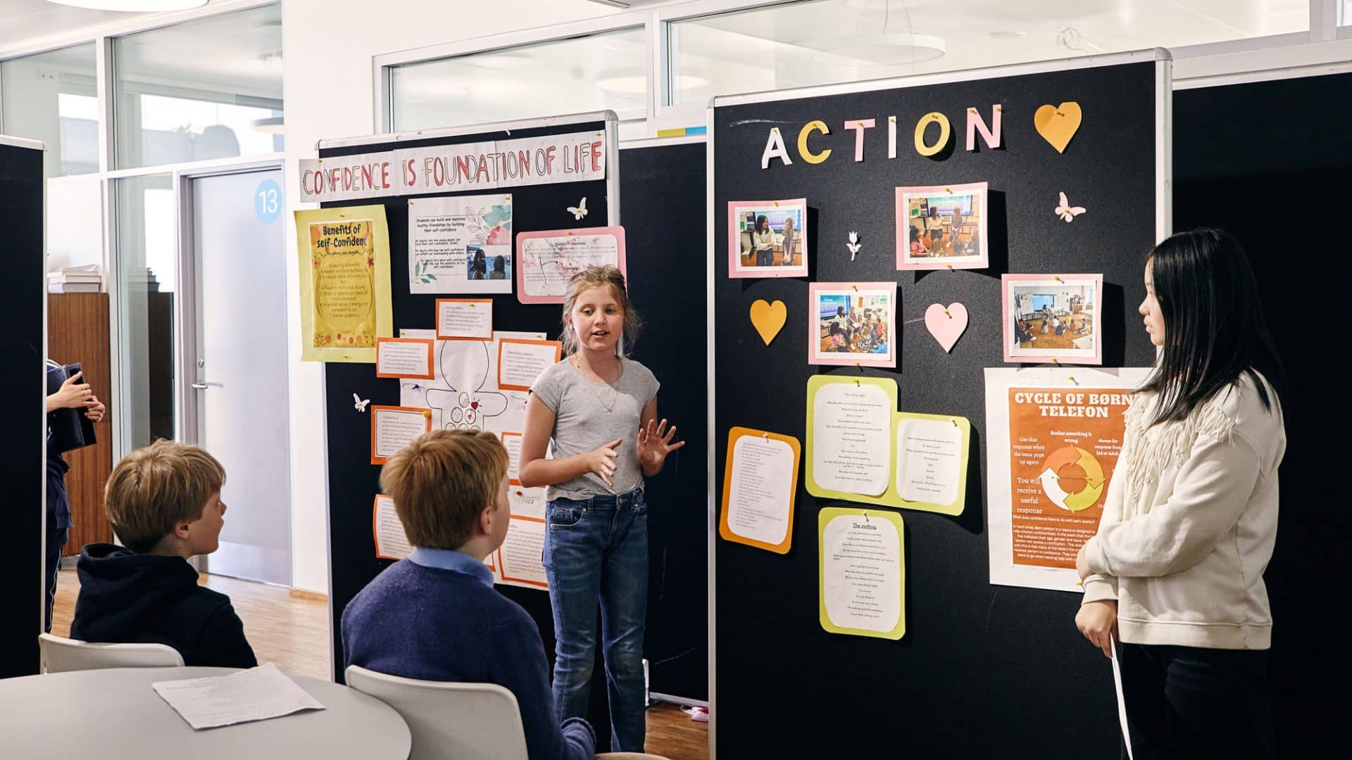 photo of students doing a presentation