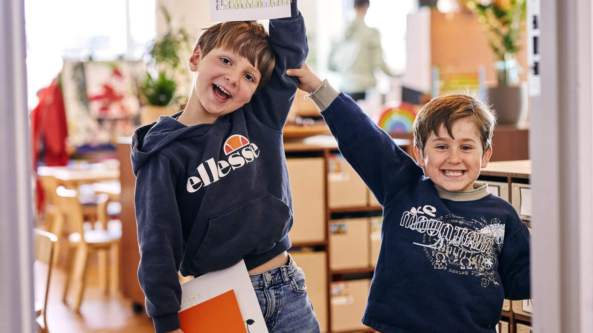 photo of students showing off their work