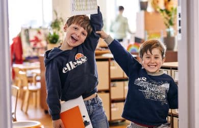 photo of students showing off their work