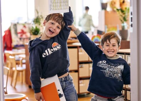photo of students showing off their work