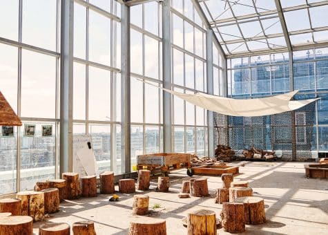 photo of CIS campus atrium with light and places to sit and socialise