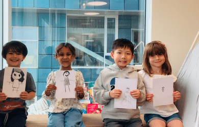 photo of early childhood students and their drawings