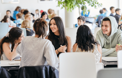 students talking in the cafeteria