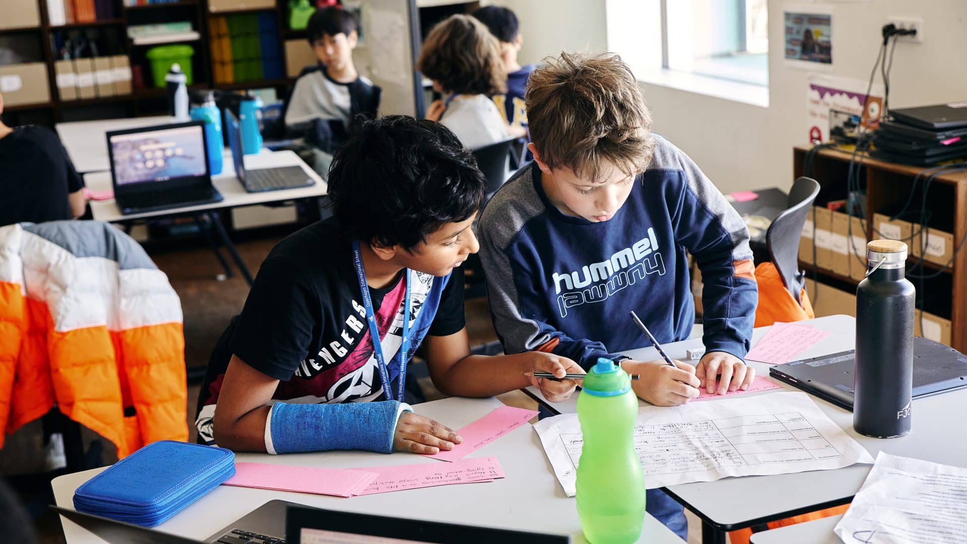 photo of students working together
