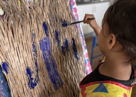 photo of early childhood student doing art