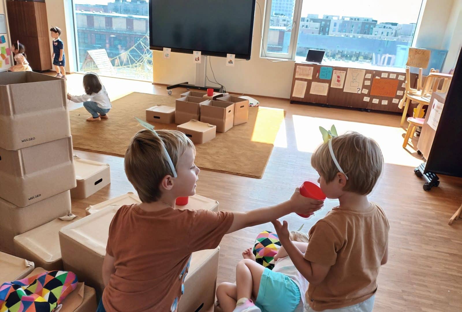 early years students interacting in the classroom