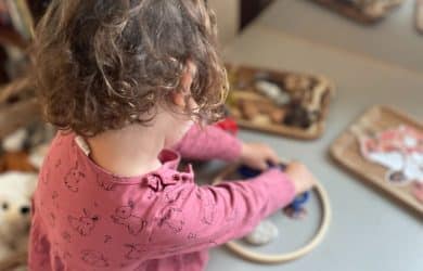 early years student playing with clay