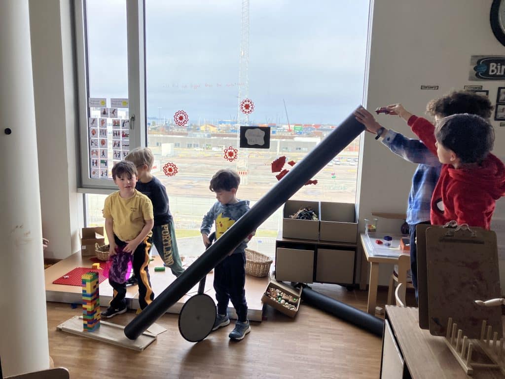 kindergarten class with telescope