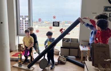 kindergarten class with telescope