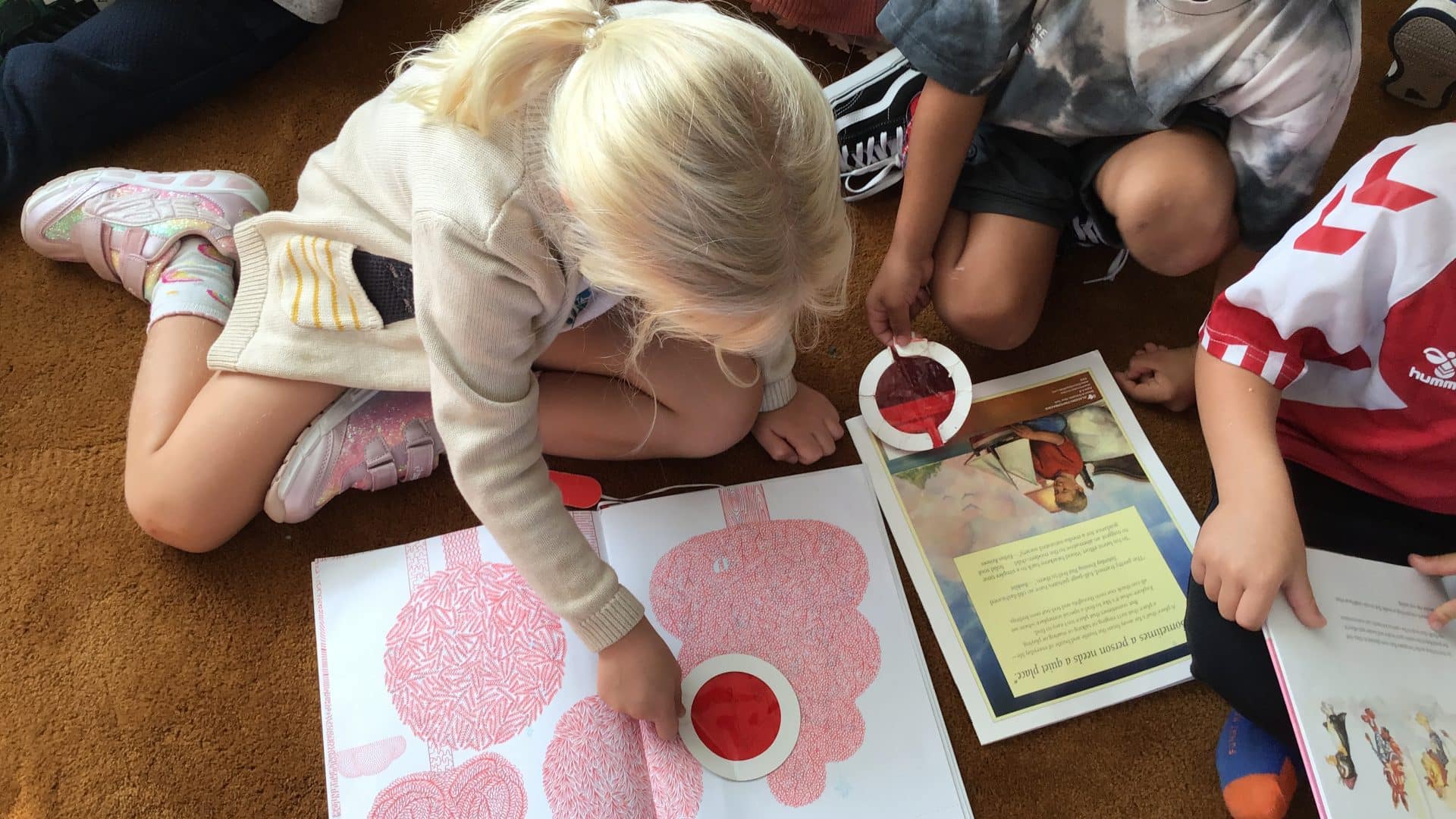 Kindergarten students learning colours