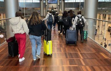 CIS students at the airport with their suitcases