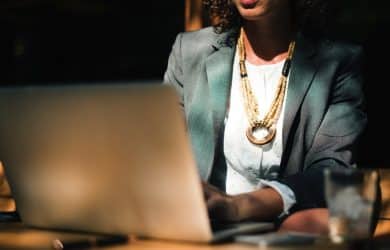 woman looking at computer