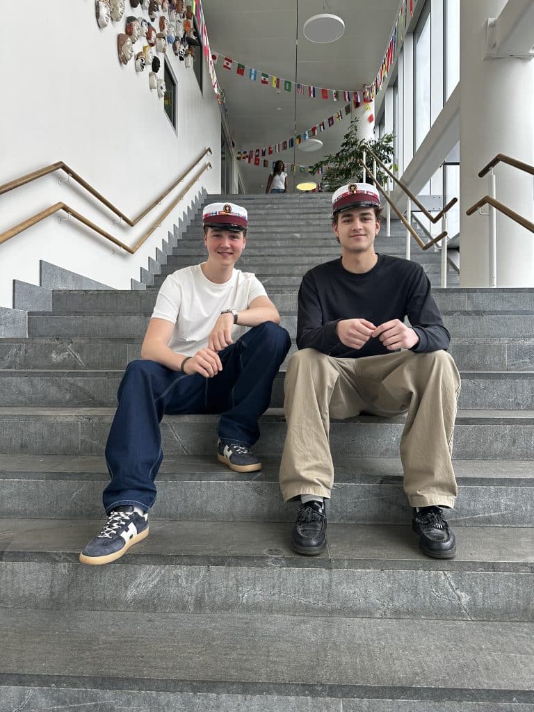 Platon and Marko sitting on steps